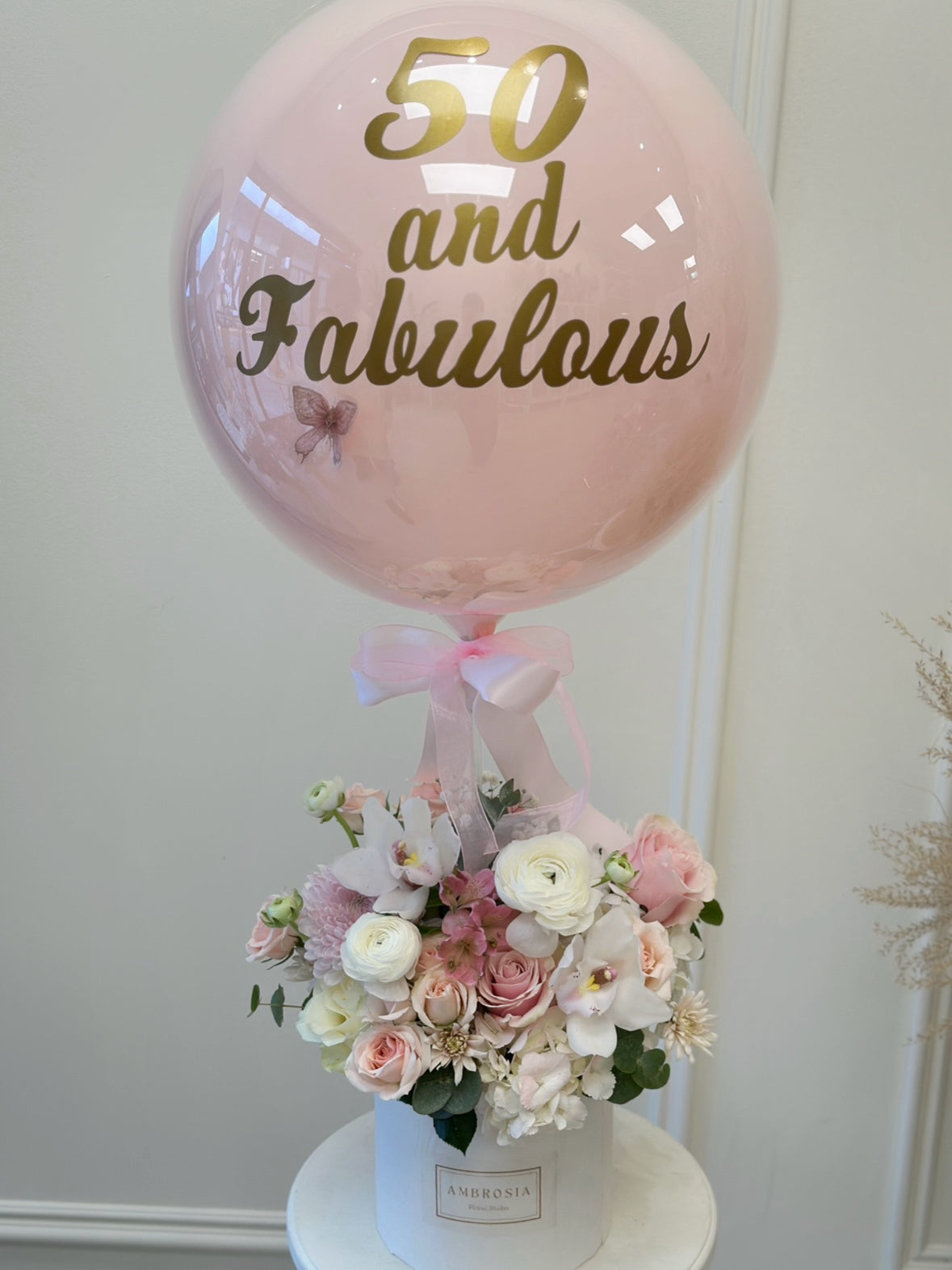 A Custom Celebration Floral Hat Box with Balloon