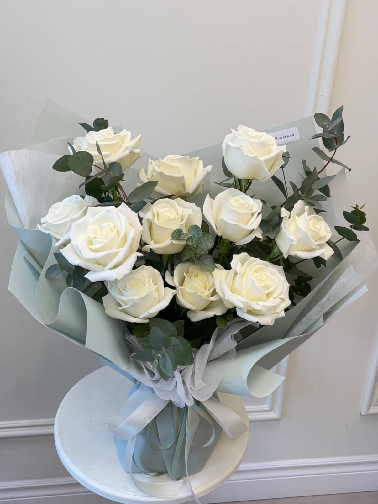 A Serene Whisper – White Rose & Eucalyptus Bouquet