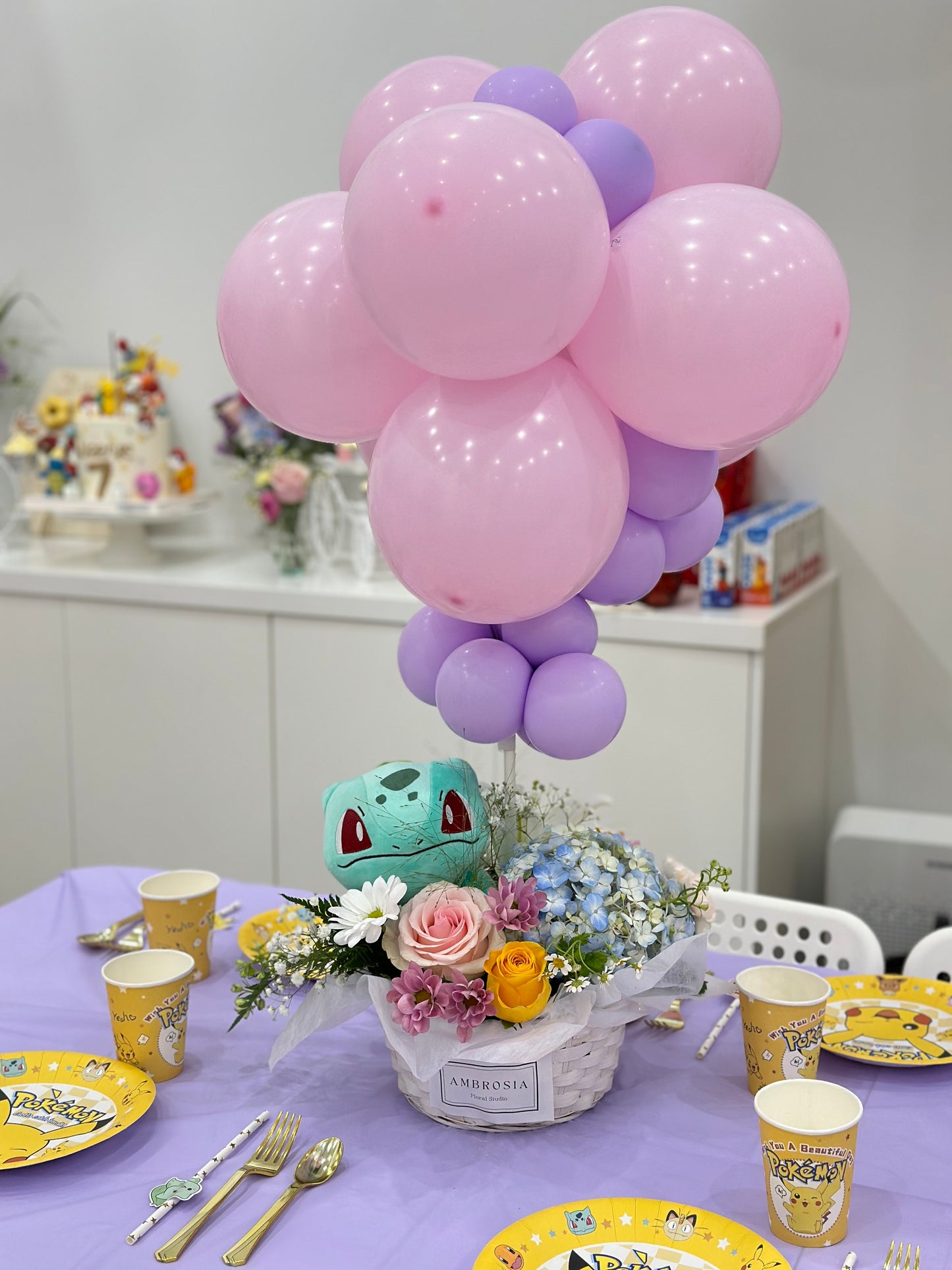 Party Balloon Center Piece with plushy toy and fresh flowers