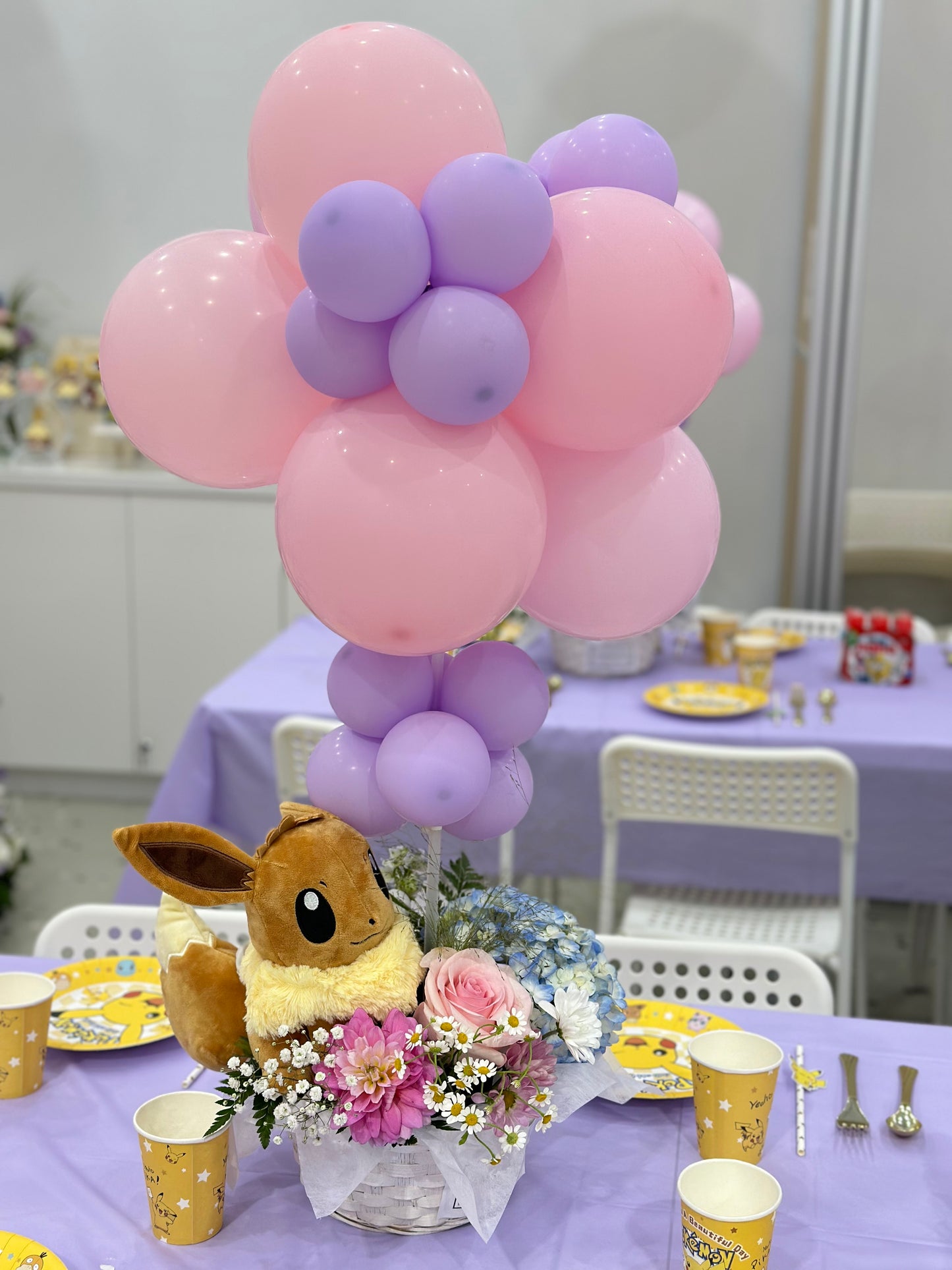 Party Balloon Center Piece with plushy toy and fresh flowers